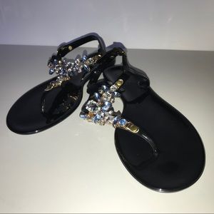 Cupid Black thong sandal.
